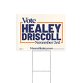 Rectangular yard sign with white background, bold navy blue and orange text reading "Vote Healey Driscoll November 3rd" with